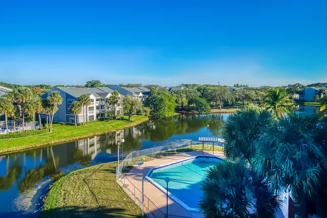 a house view with a lake view