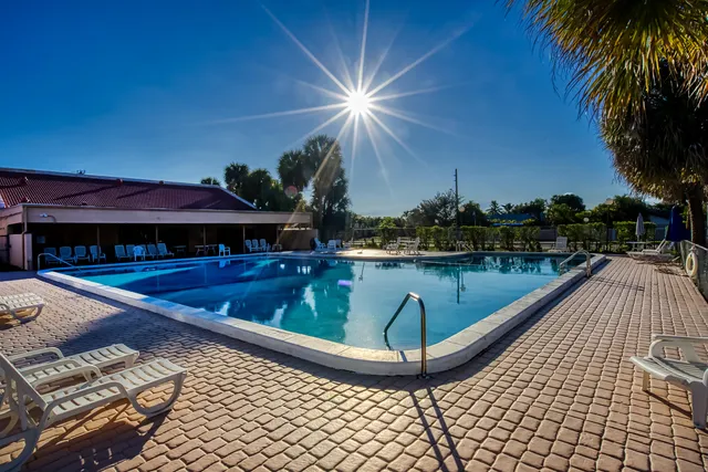 a terrace with outdoor seating and city view