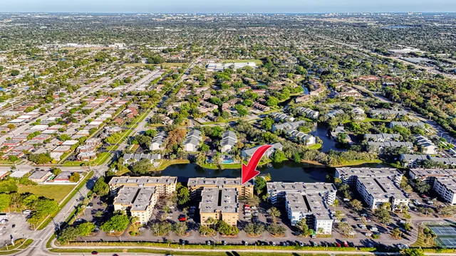 a bird view of building and yard