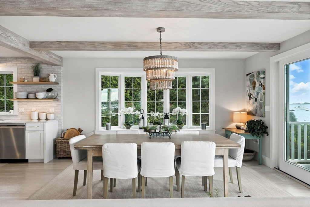 131 Front Street Marblehead, MA 01945 - Photo 11 of 41 a dining room with furniture a chandelier and wooden floor