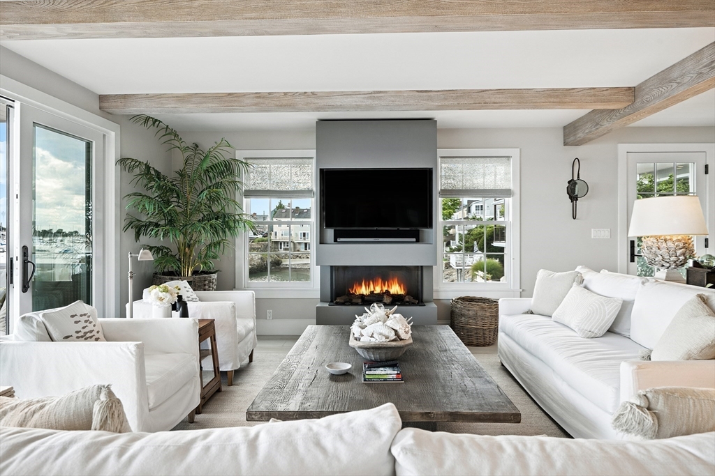 131 Front Street Marblehead, MA 01945 - Photo 13 of 41 a living room with furniture and a fireplace