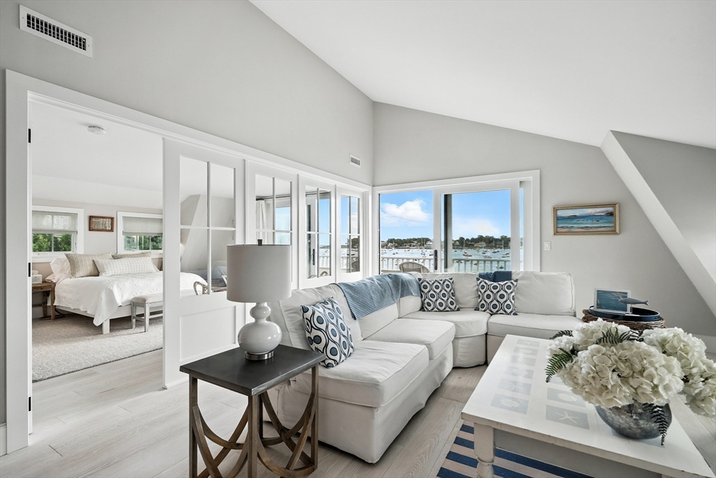 131 Front Street Marblehead, MA 01945 - Photo 20 of 41 a living room with furniture and a large window