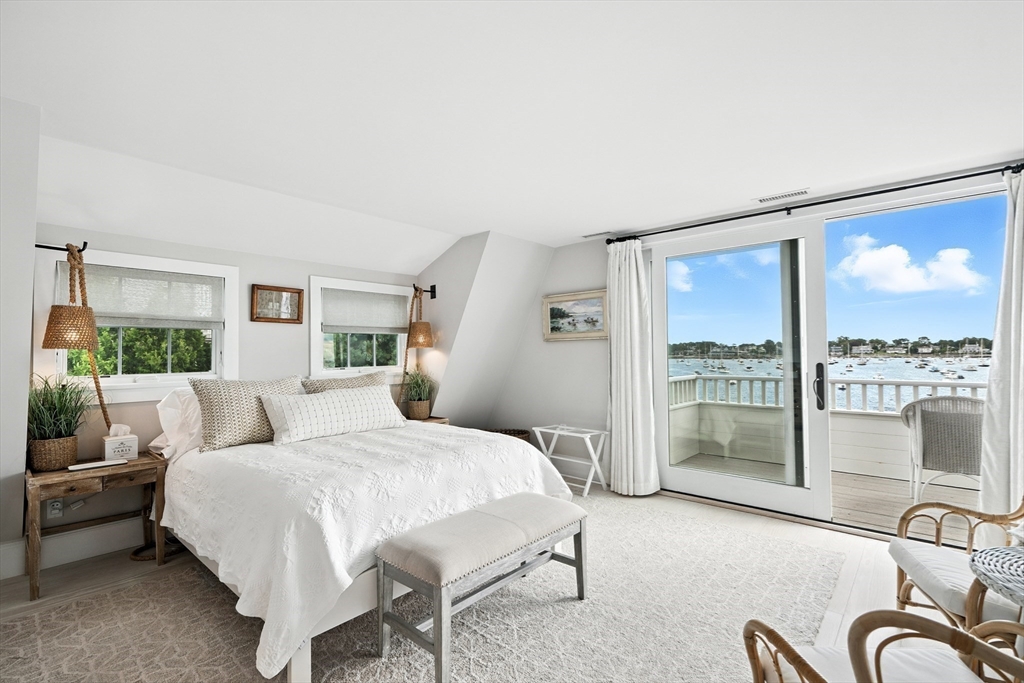 131 Front Street Marblehead, MA 01945 - Photo 21 of 41 a living room with furniture and large windows