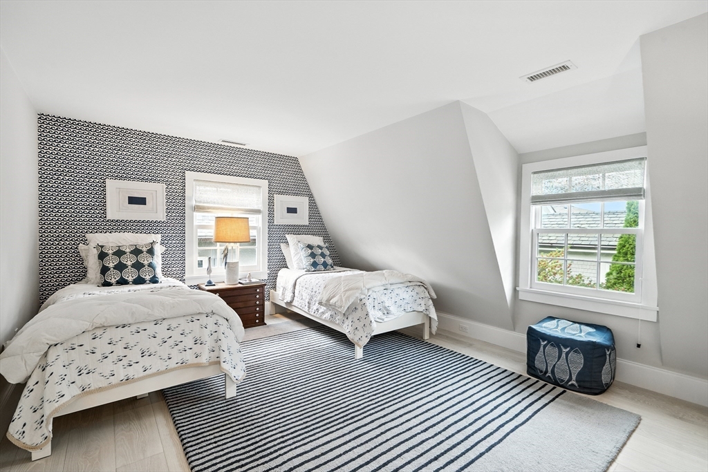 131 Front Street Marblehead, MA 01945 - Photo 23 of 41 a bedroom with two beds and a couch