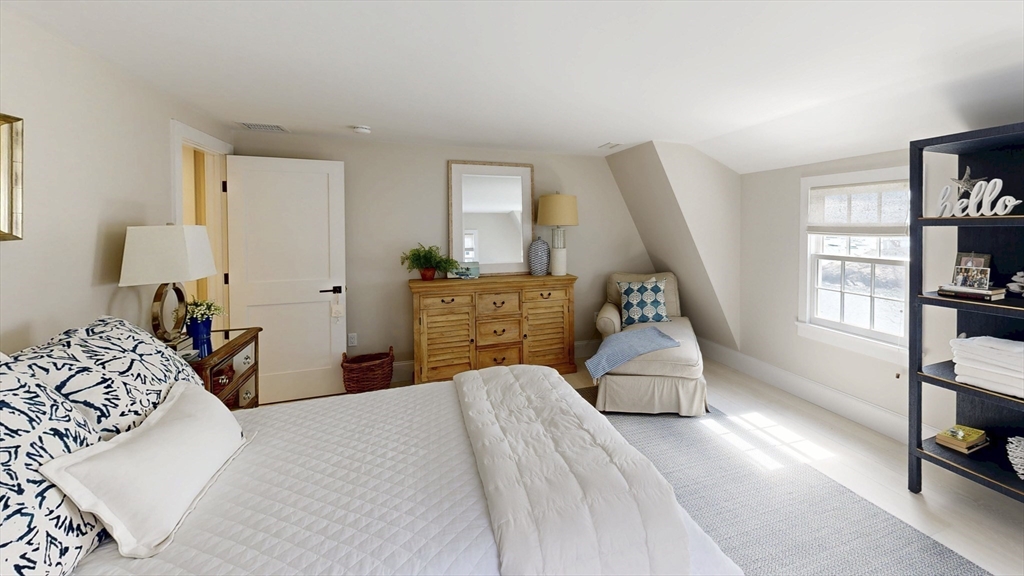 131 Front Street Marblehead, MA 01945 - Photo 24 of 41 a bedroom with a bed and a window