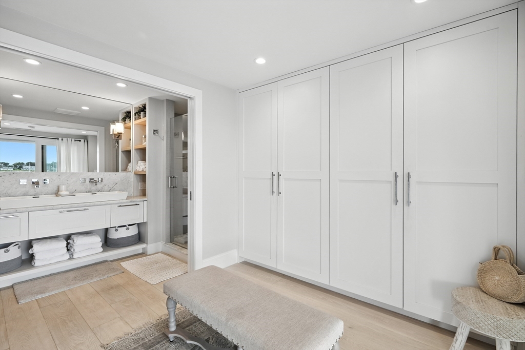 131 Front Street Marblehead, MA 01945 - Photo 29 of 41 a bathroom with a sink and a mirror