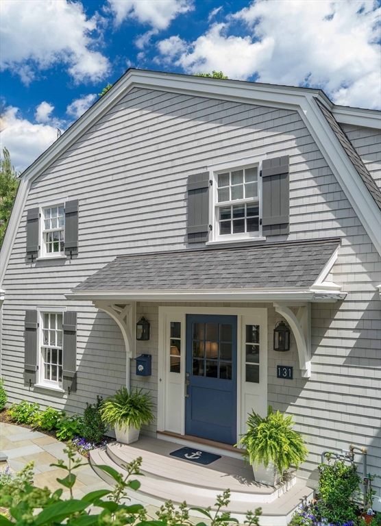 131 Front Street Marblehead, MA 01945 - Photo 3 of 41 a front view of a house with garden