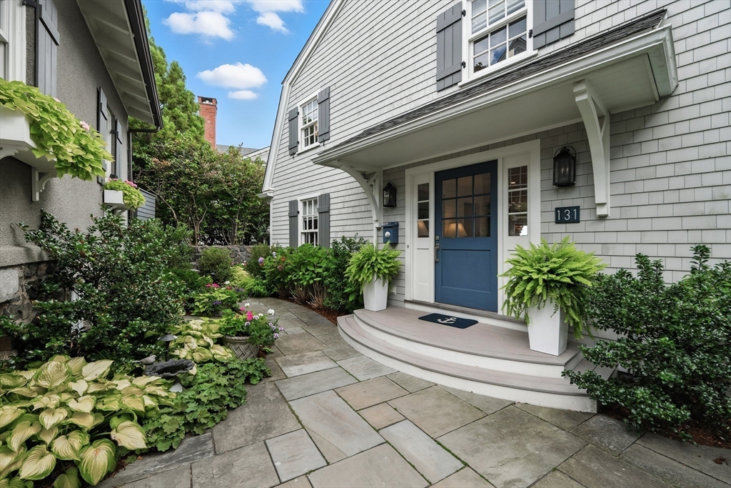131 Front Street Marblehead, MA 01945 - Photo 5 of 41 a house with potted plants in front of house