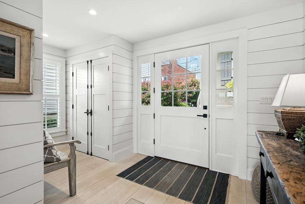 131 Front Street Marblehead, MA 01945 - Photo 7 of 41 a view of a livingroom with wooden floor and furniture