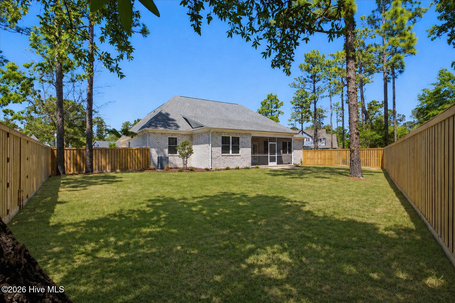 23 Stonegate Circle Hampstead, NC 28443 - Photo 21 of 64 Do you have a dog or little ones that require a fence. Owners just installed one for you.