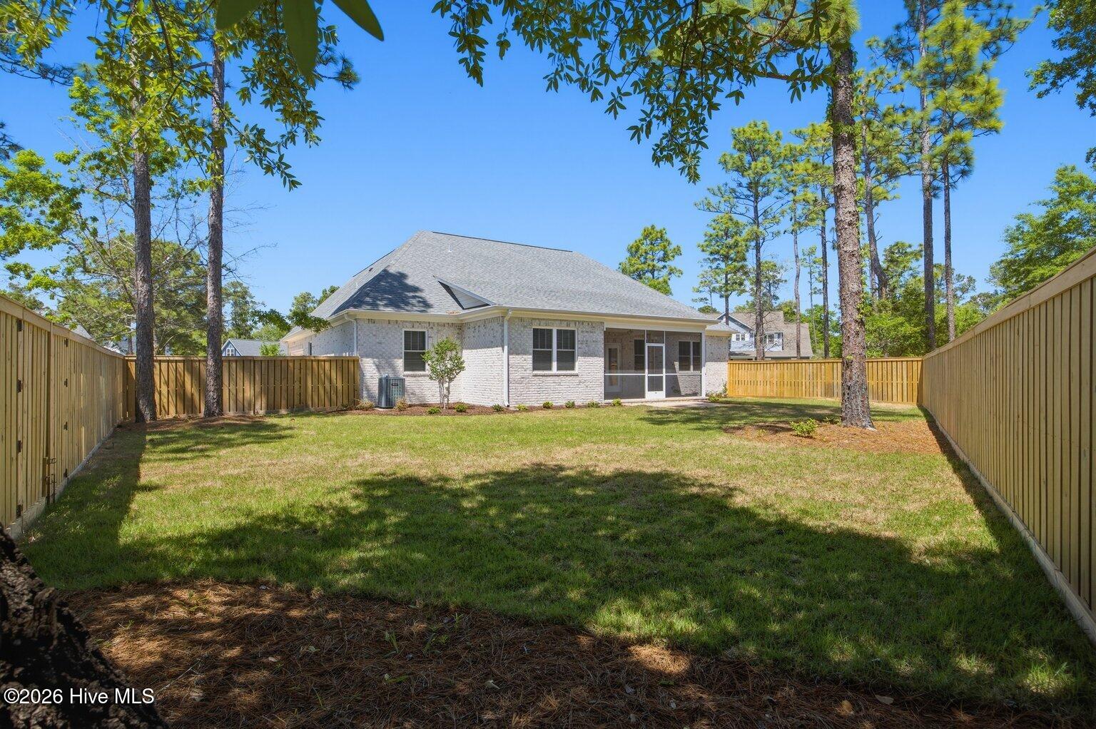 23 Stonegate Circle Hampstead, NC 28443 - Photo 23 of 69 Do you have a dog or little ones that require a fence. Owners just installed one for you.
