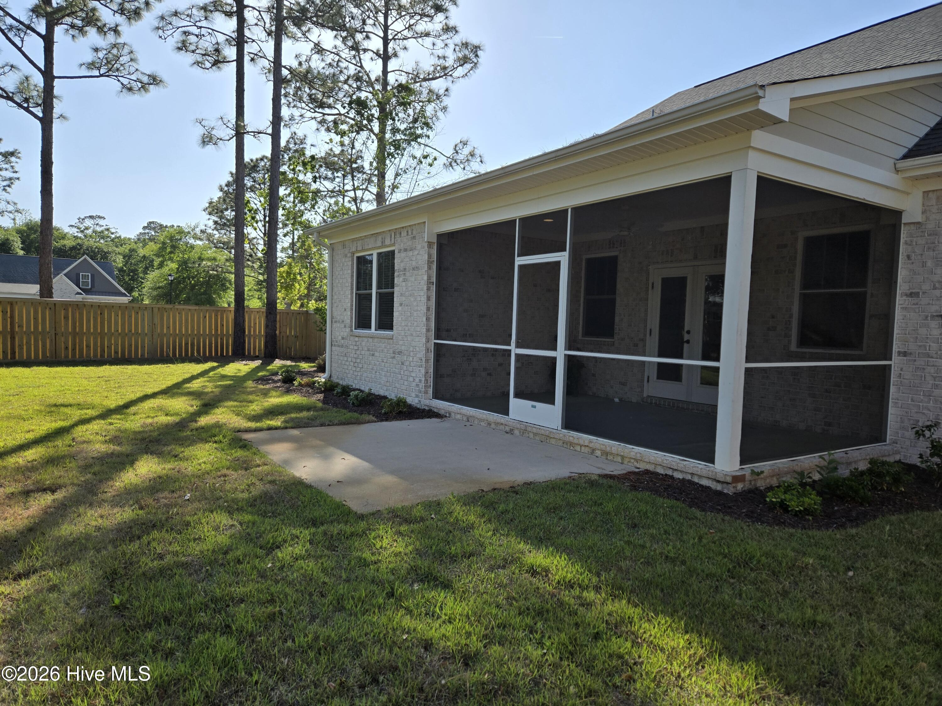 23 Stonegate Circle Hampstead, NC 28443 - Photo 24 of 69 Plenty of room in the screened porch for a new set of patio furniture
