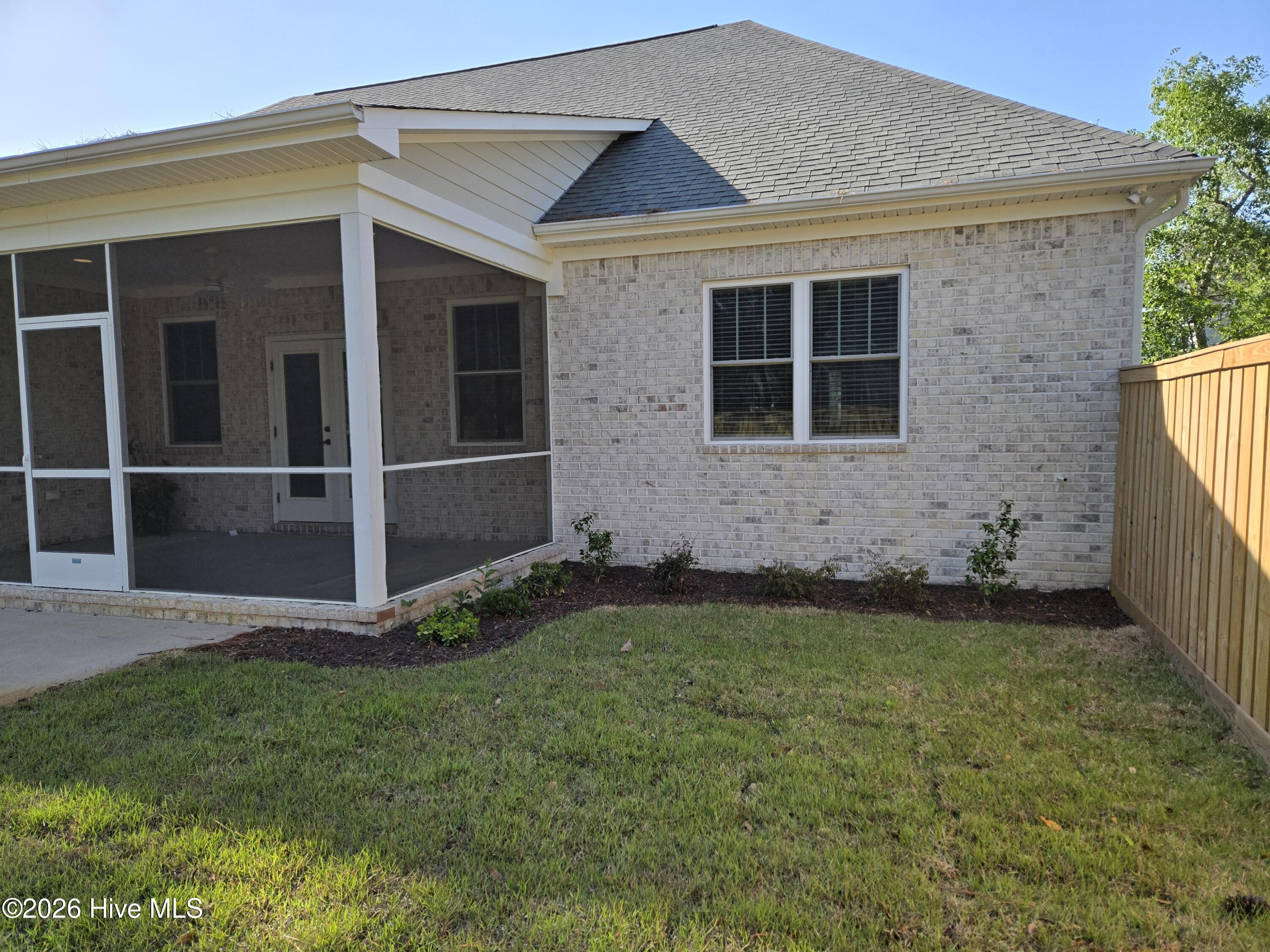 23 Stonegate Circle Hampstead, NC 28443 - Photo 24 of 64 New sod and bushes