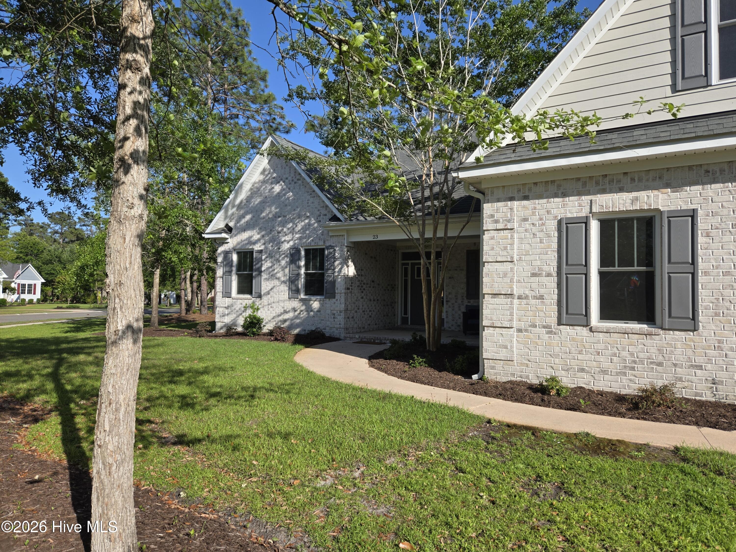 23 Stonegate Circle Hampstead, NC 28443 - Photo 2 of 69 Pathway from driveway to the front door