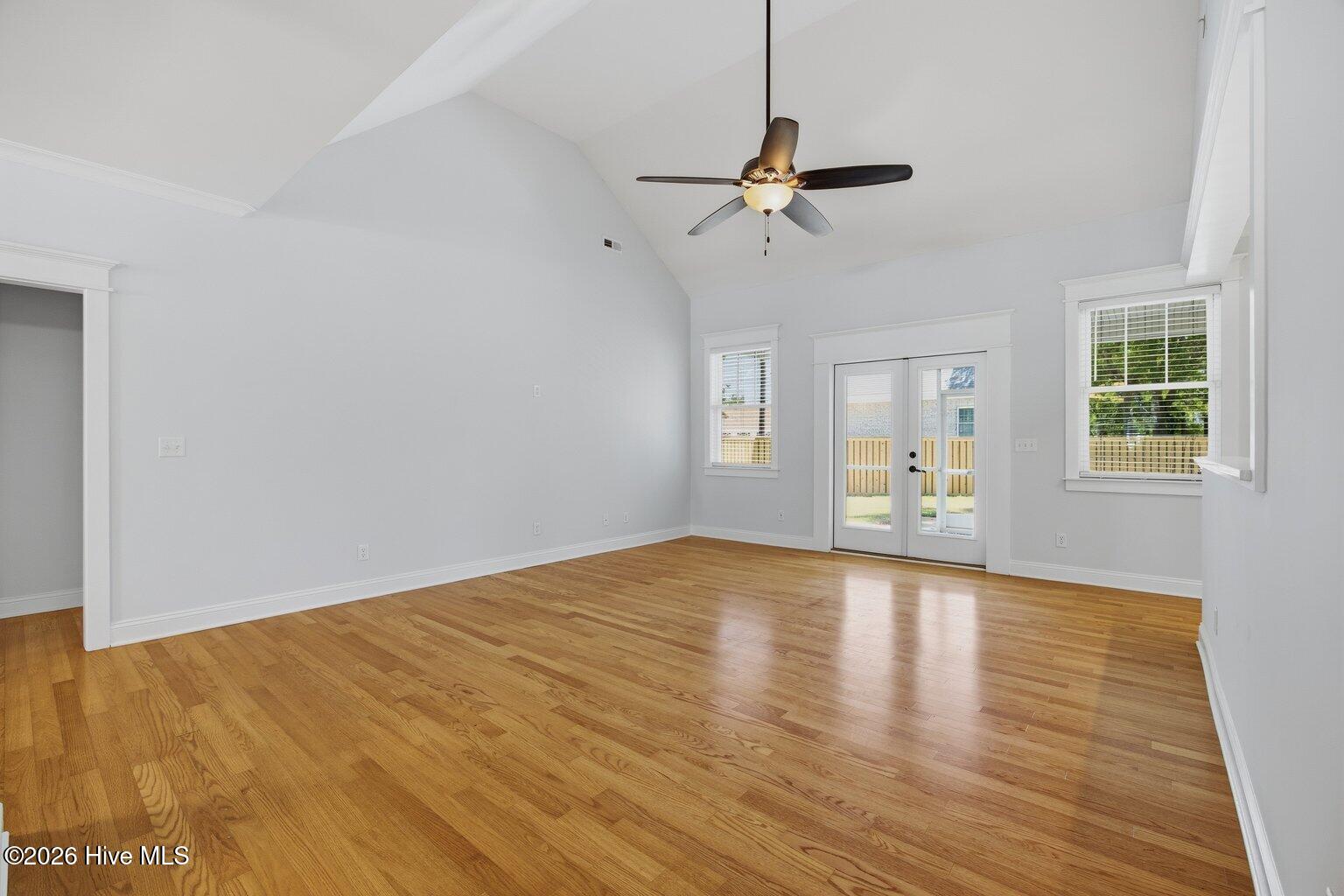 23 Stonegate Circle Hampstead, NC 28443 - Photo 32 of 69 Family Room with french doors leading to the screened porch