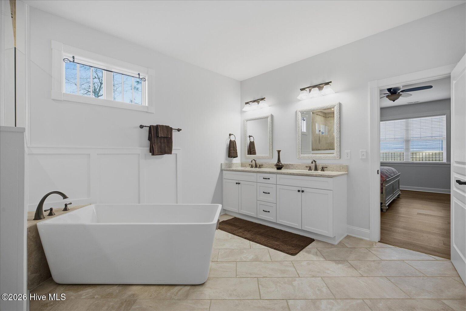 23 Stonegate Circle Hampstead, NC 28443 - Photo 37 of 69 Need a good soak after a long day at work. This deep spa tub is sure to please.