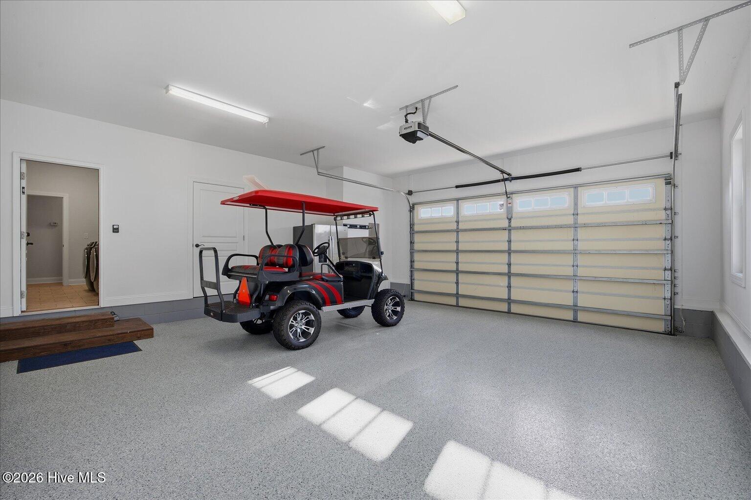 23 Stonegate Circle Hampstead, NC 28443 - Photo 37 of 64 New Epoxy Floors too pretty to drive on