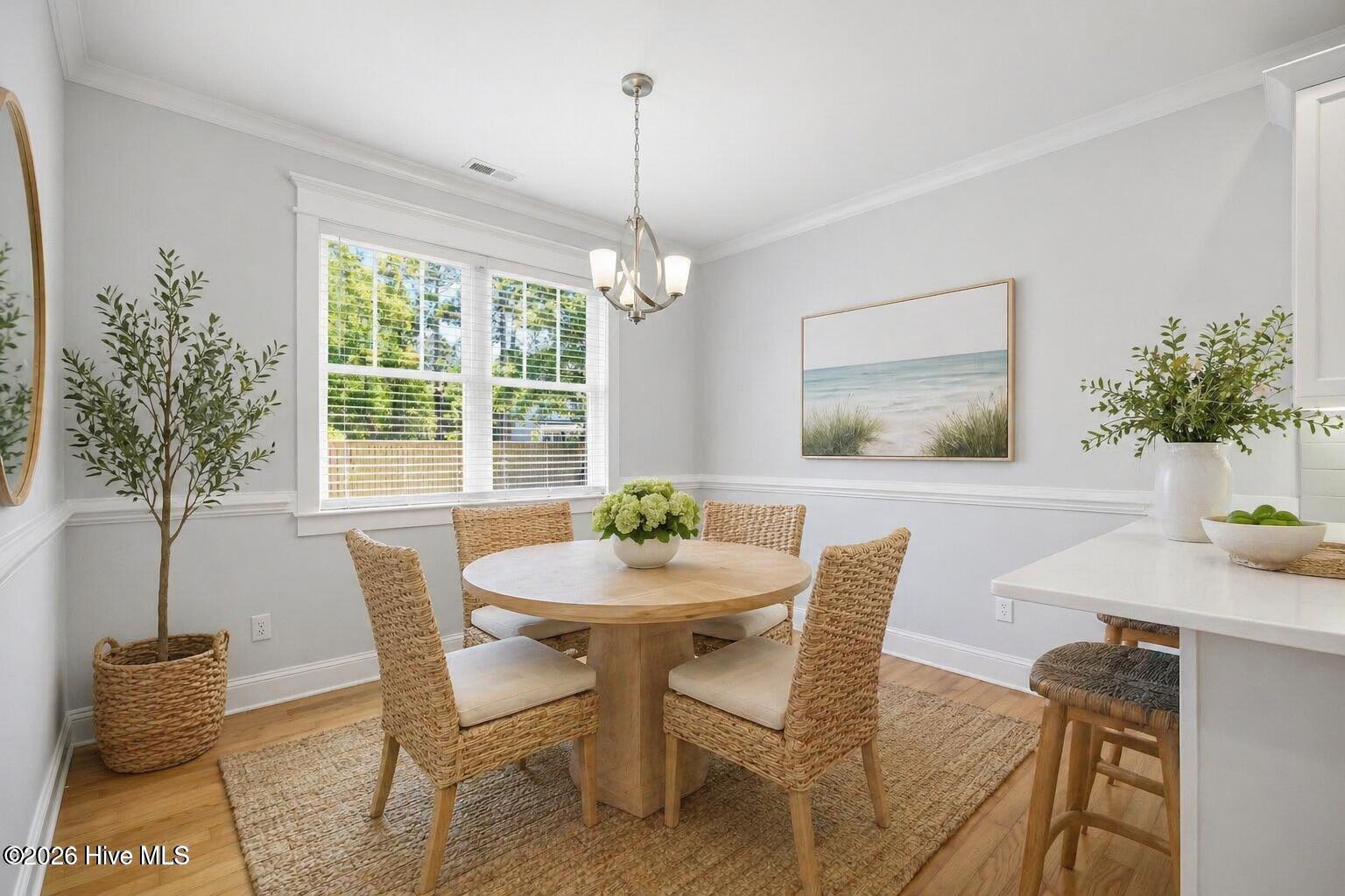 23 Stonegate Circle Hampstead, NC 28443 - Photo 8 of 64 Breakfast Room with extra barstool seating at the new quartz countertops