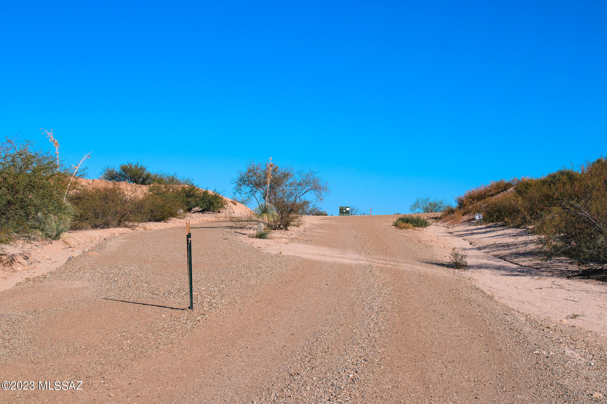 Ramsey Road, Unit 4 Benson, AZ 85602 - Photo 21 of 24 a view of a road with a building in the background