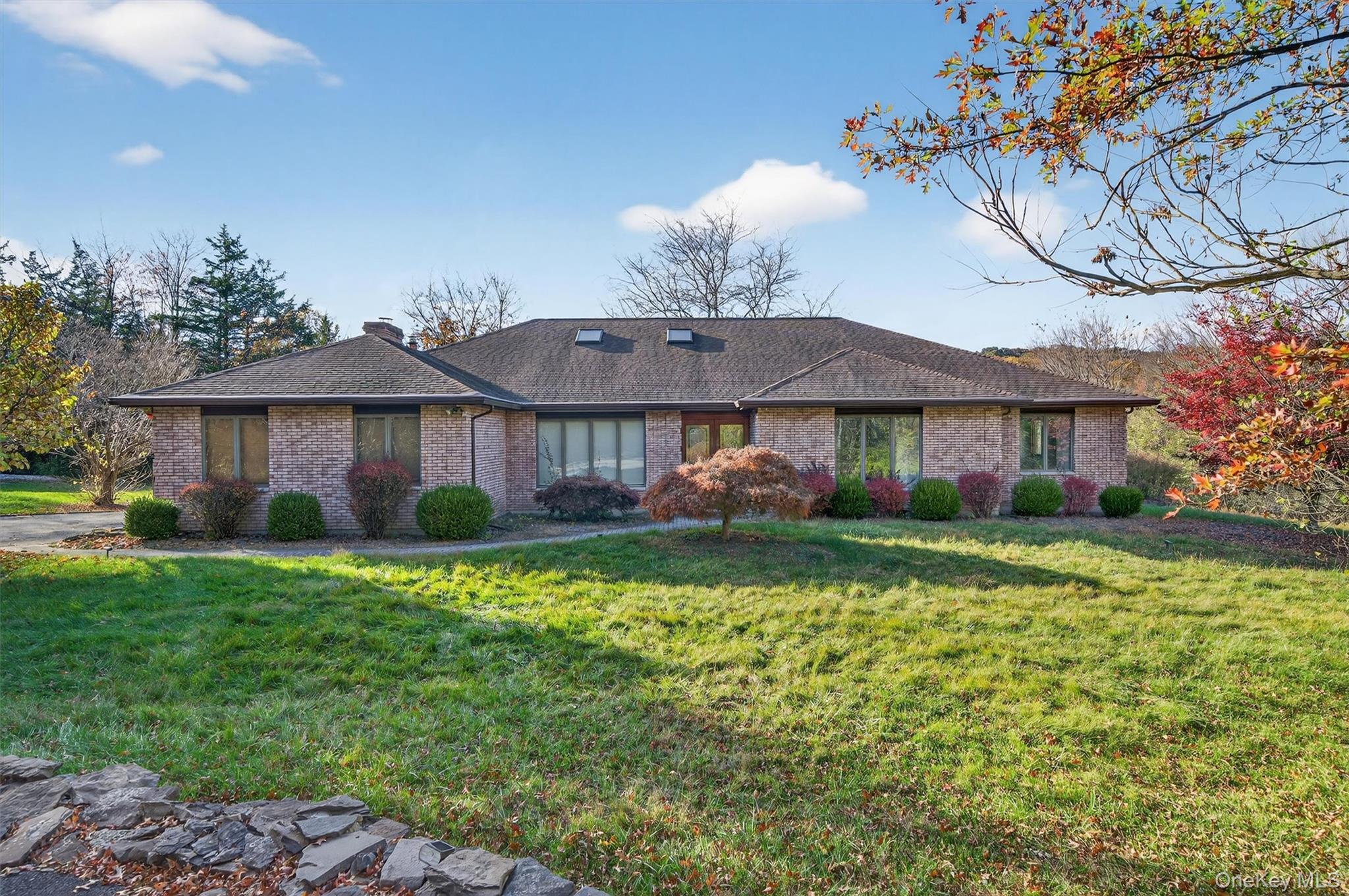 220 Oxford Road Chester, NY 10918 - Photo 1 of 50 a front view of a house with a yard