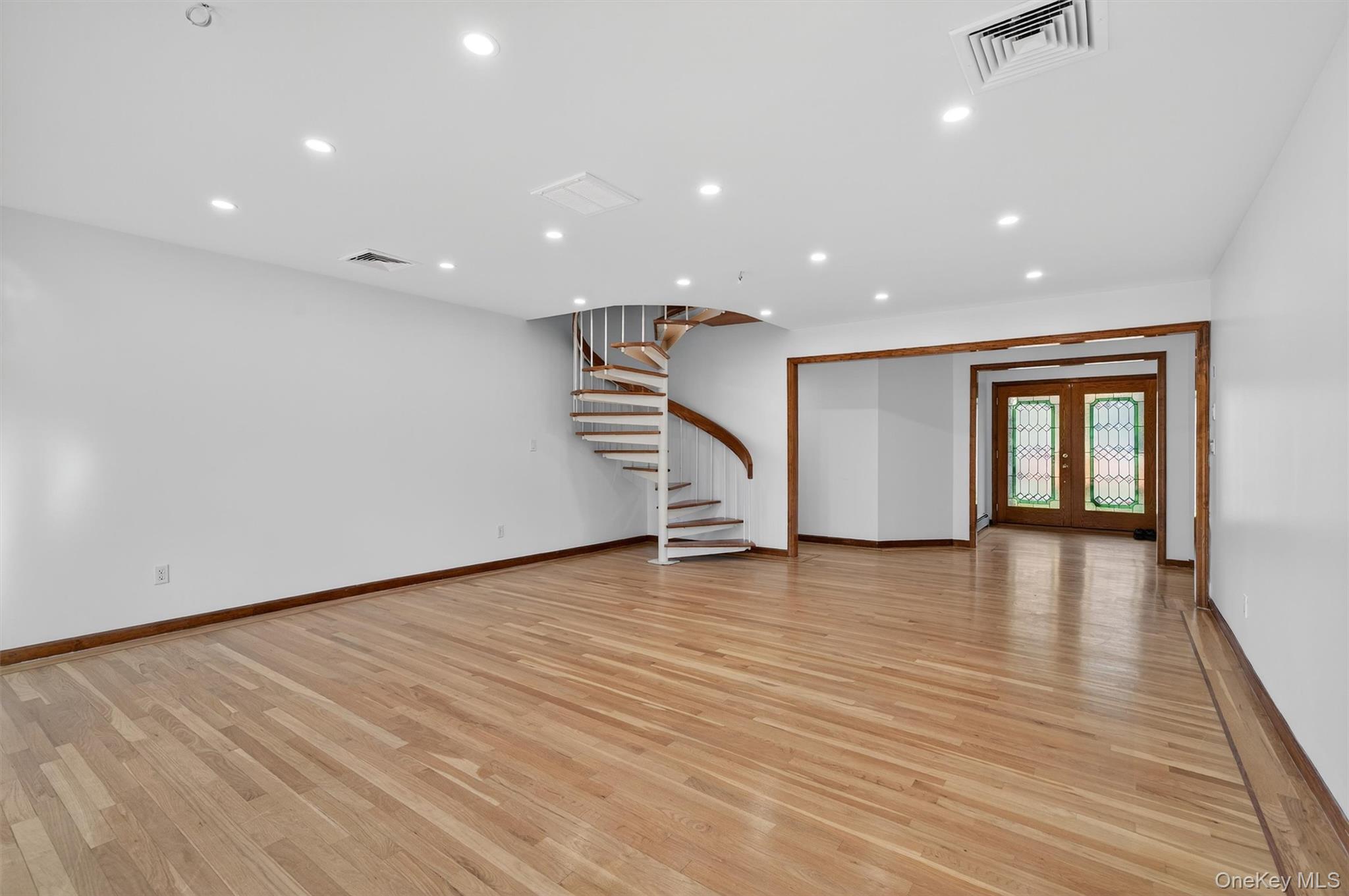 220 Oxford Road Chester, NY 10918 - Photo 23 of 50 a view of empty room with wooden floor and stairs