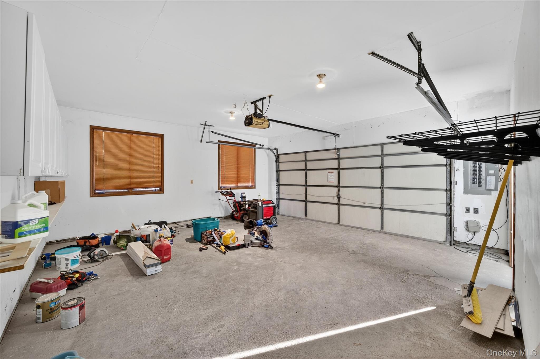 220 Oxford Road Chester, NY 10918 - Photo 41 of 50 a view of a garage with gym equipment