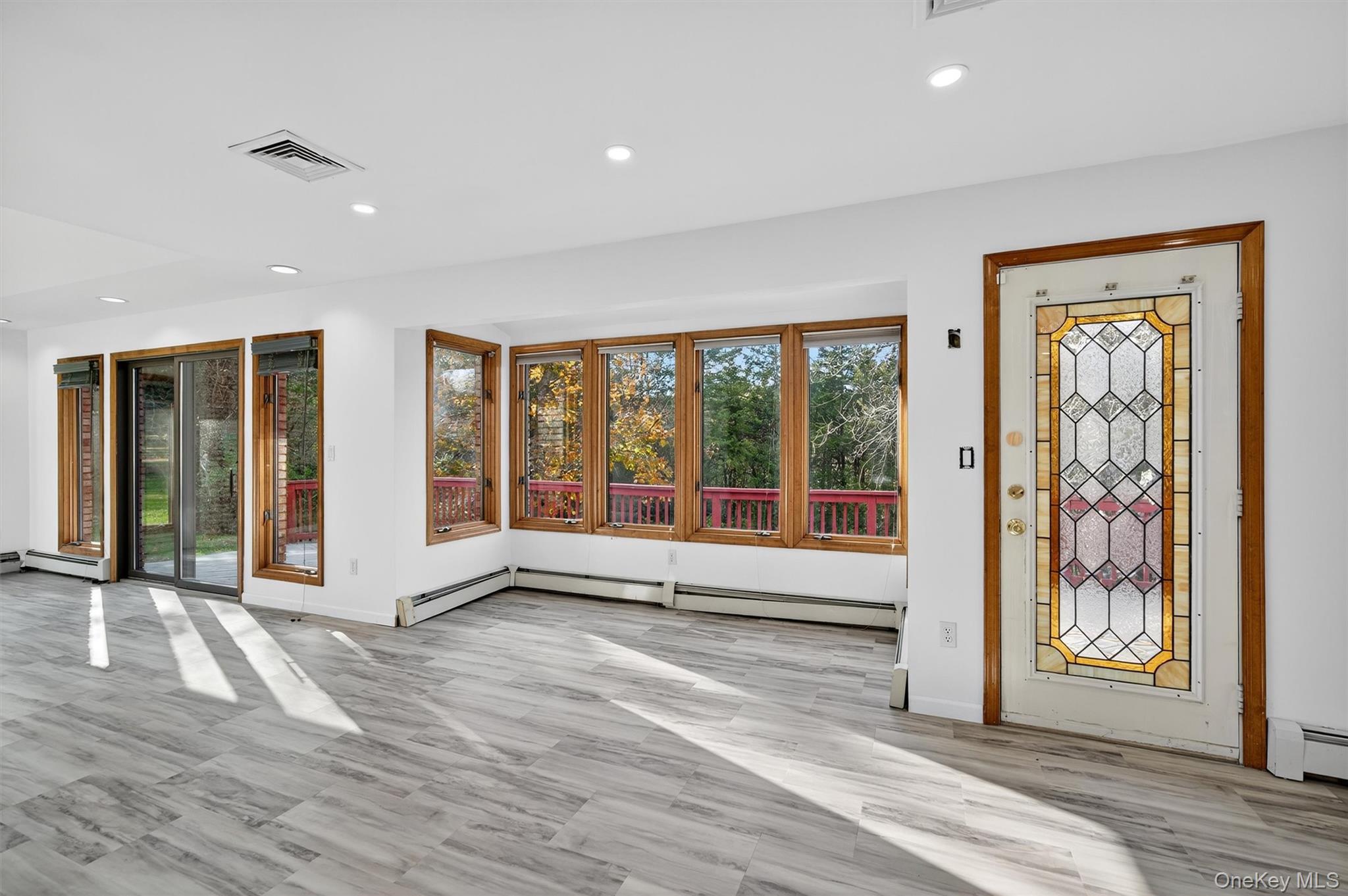 220 Oxford Road Chester, NY 10918 - Photo 6 of 50 a view of an entryway with wooden floor and door