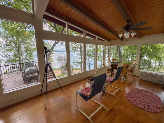 a view of a dining room with wooden floor