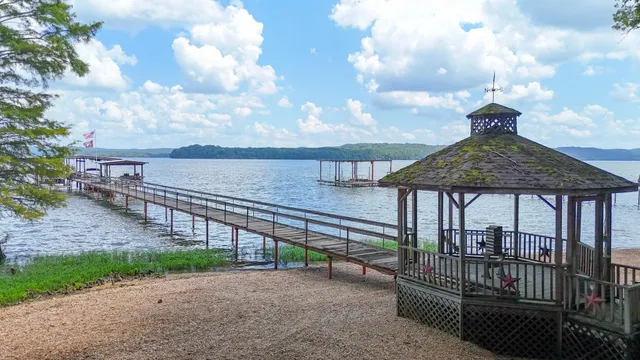 a view of a patio with a yard
