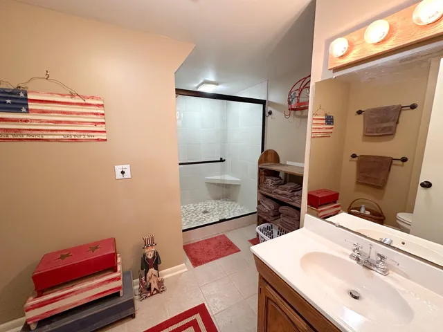 a roof deck with table and chairs