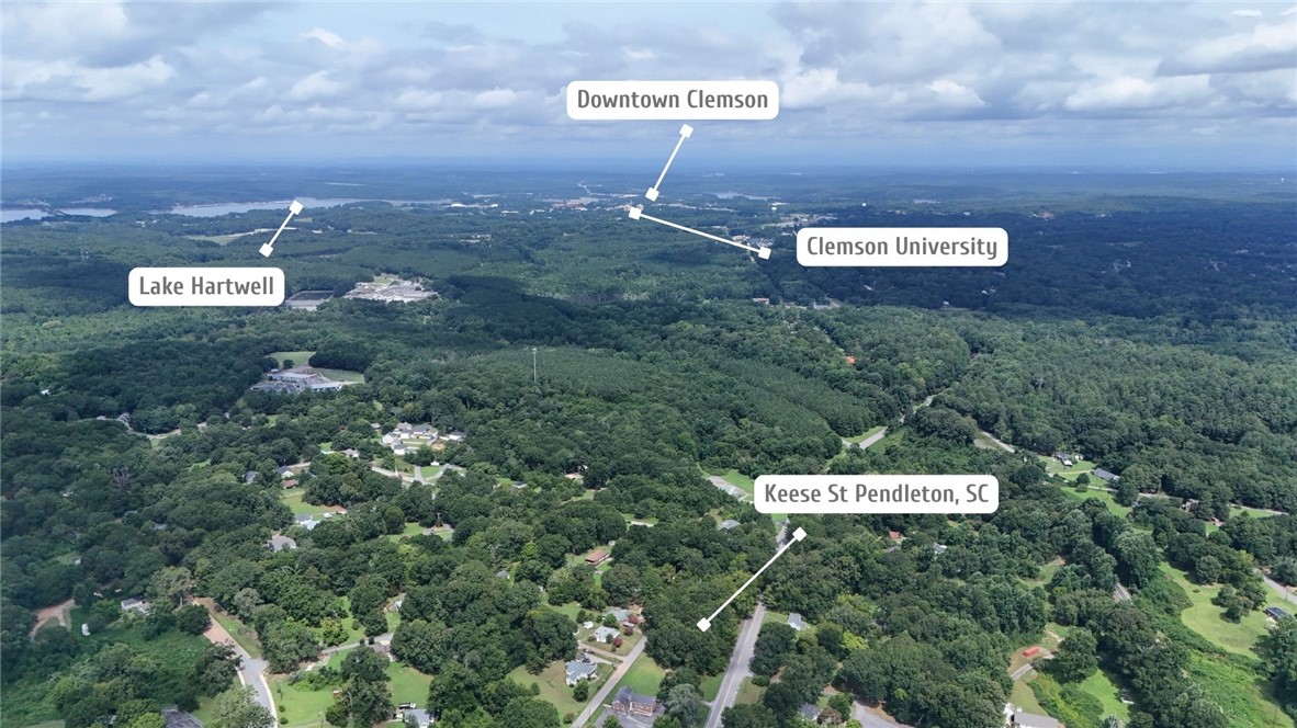 0 Keese Street Pendleton, SC 29670 - Photo 4 of 14 An aerial perspective reveals the lush, verdant landscape surrounding Lake Hartwell and the vibrant Clemson University area.