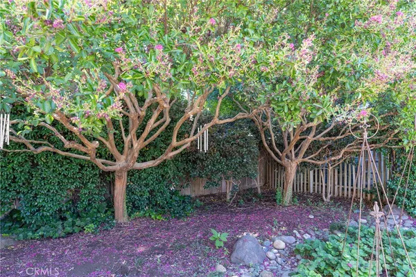 a view of a backyard with sitting area