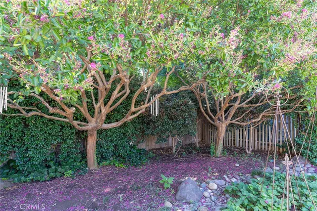 a view of a backyard with sitting area