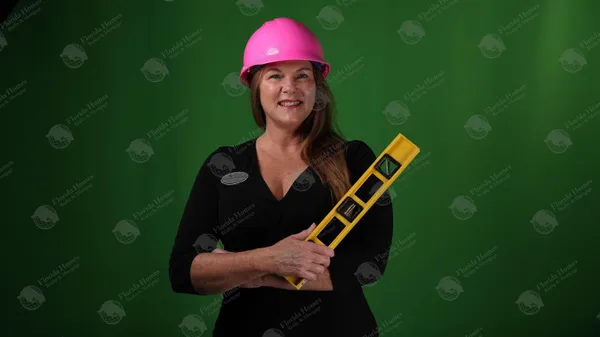 a room with pool table and chairs
