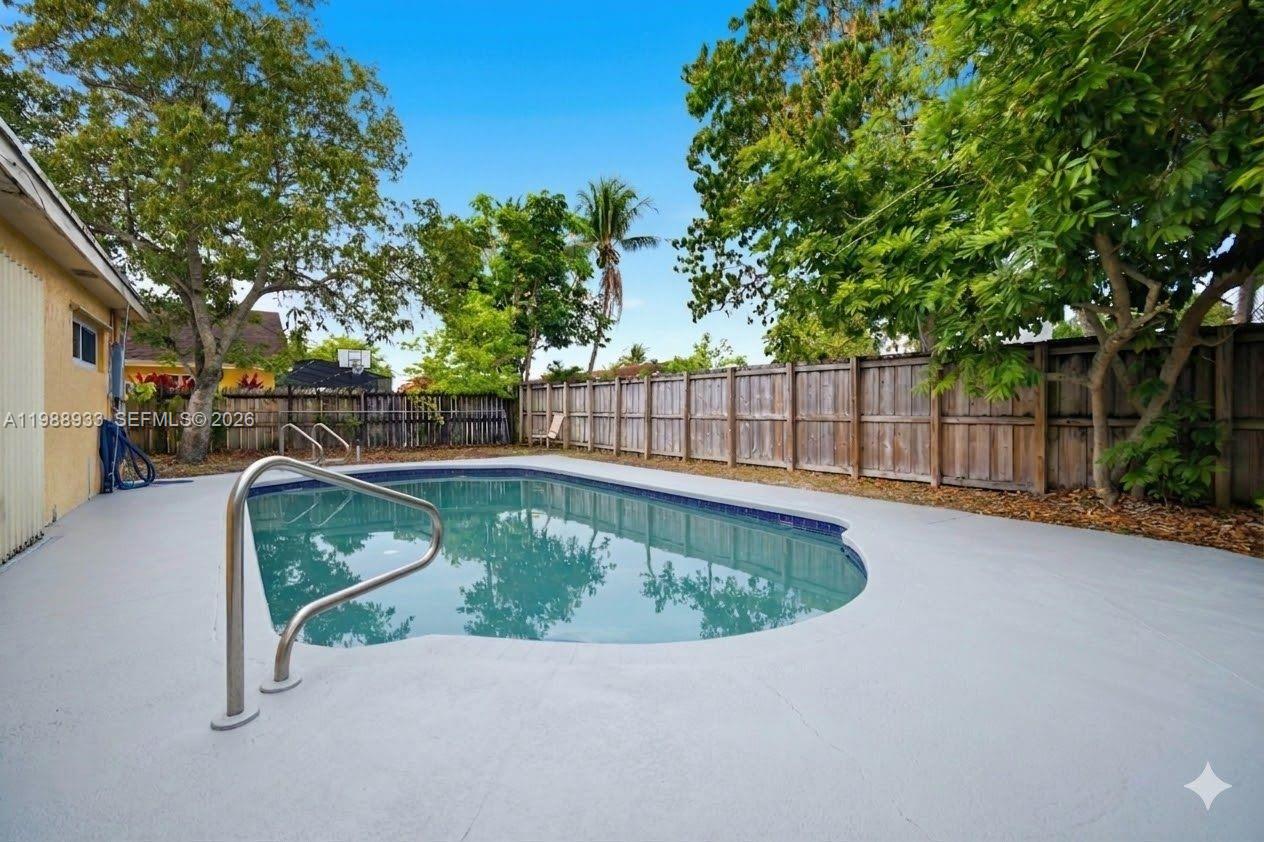 841 Southwest 55th Avenue Margate, FL 33068 - Photo 14 of 26 a view of a tennis court