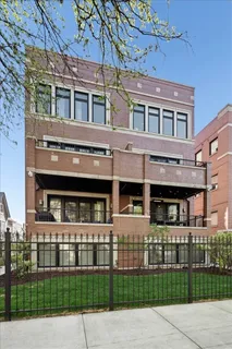 front view of a building with a yard