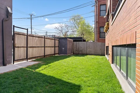 a view of a backyard with a garden