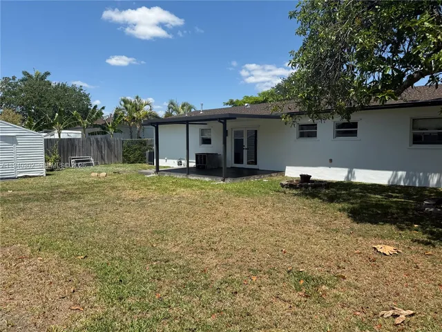 a swimming pool view with a outdoor space