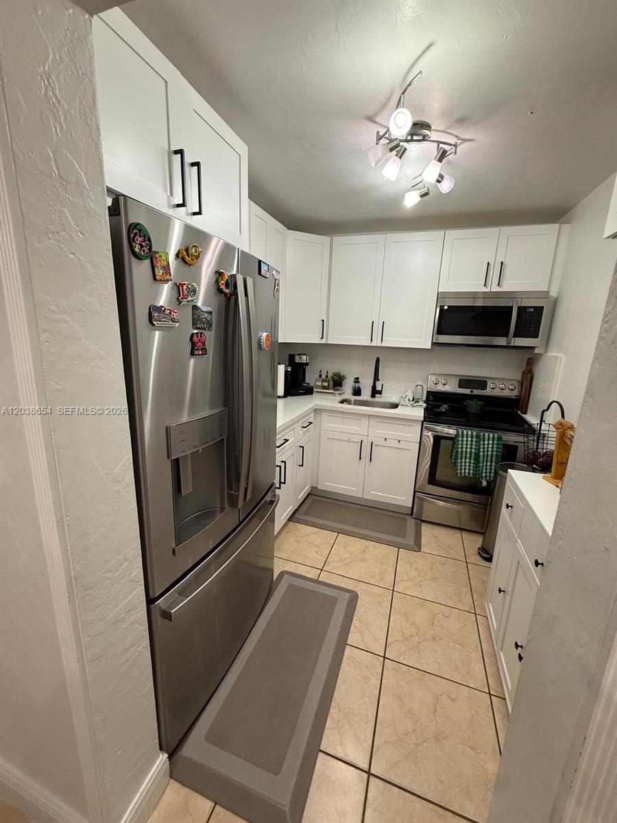 1275 West 35th Street, Unit 32B Hialeah, FL 33012 - Photo 4 of 11