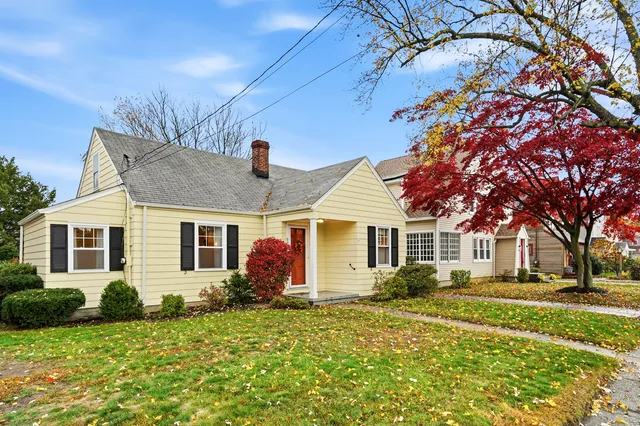 front view of a house with a yard
