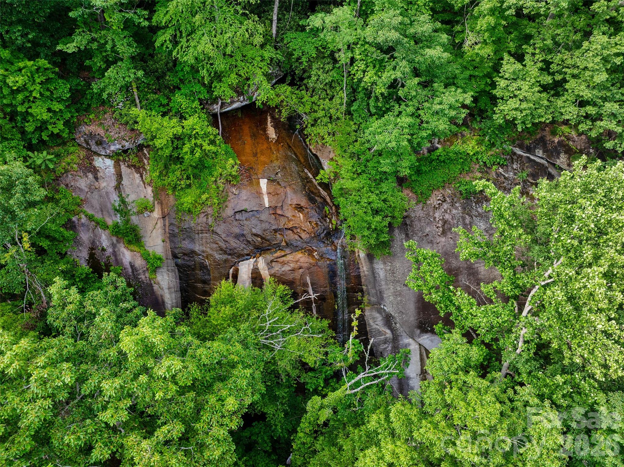 0 Locust Grove Road, Unit 2 Hendersonville, NC 28792 - Photo 2 of 19 an aerial view of a house with a yard