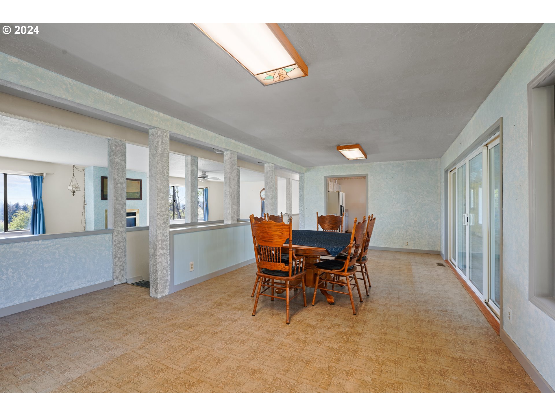 18787 Southeast Sunnyside Road Damascus, OR 97089 - Photo 14 of 36 a dining room with furniture and window