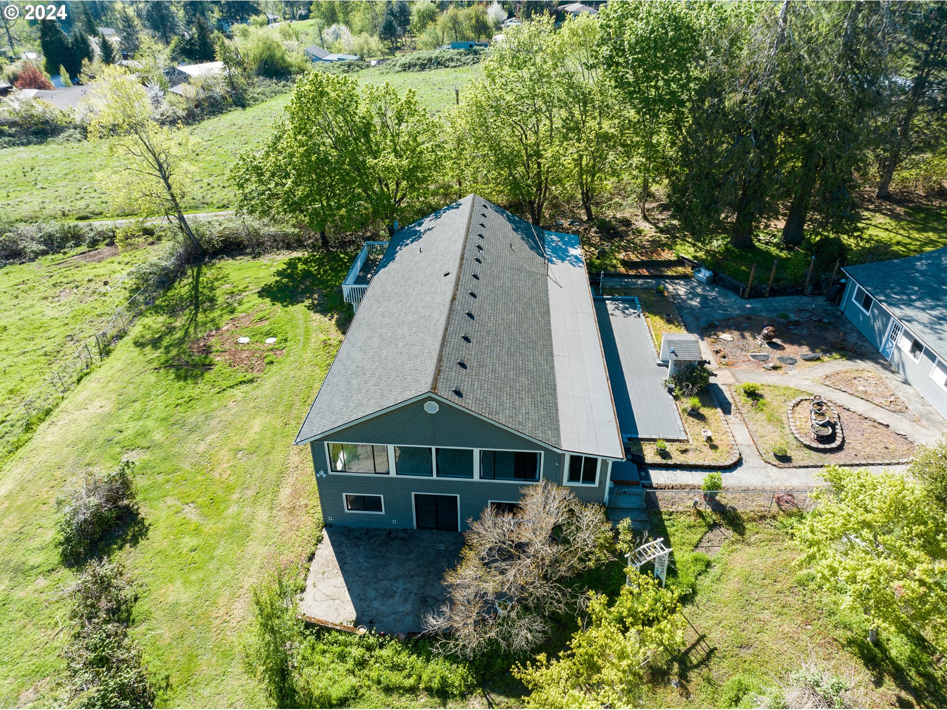 18787 Southeast Sunnyside Road Damascus, OR 97089 - Photo 30 of 36 an aerial view of a house with a yard