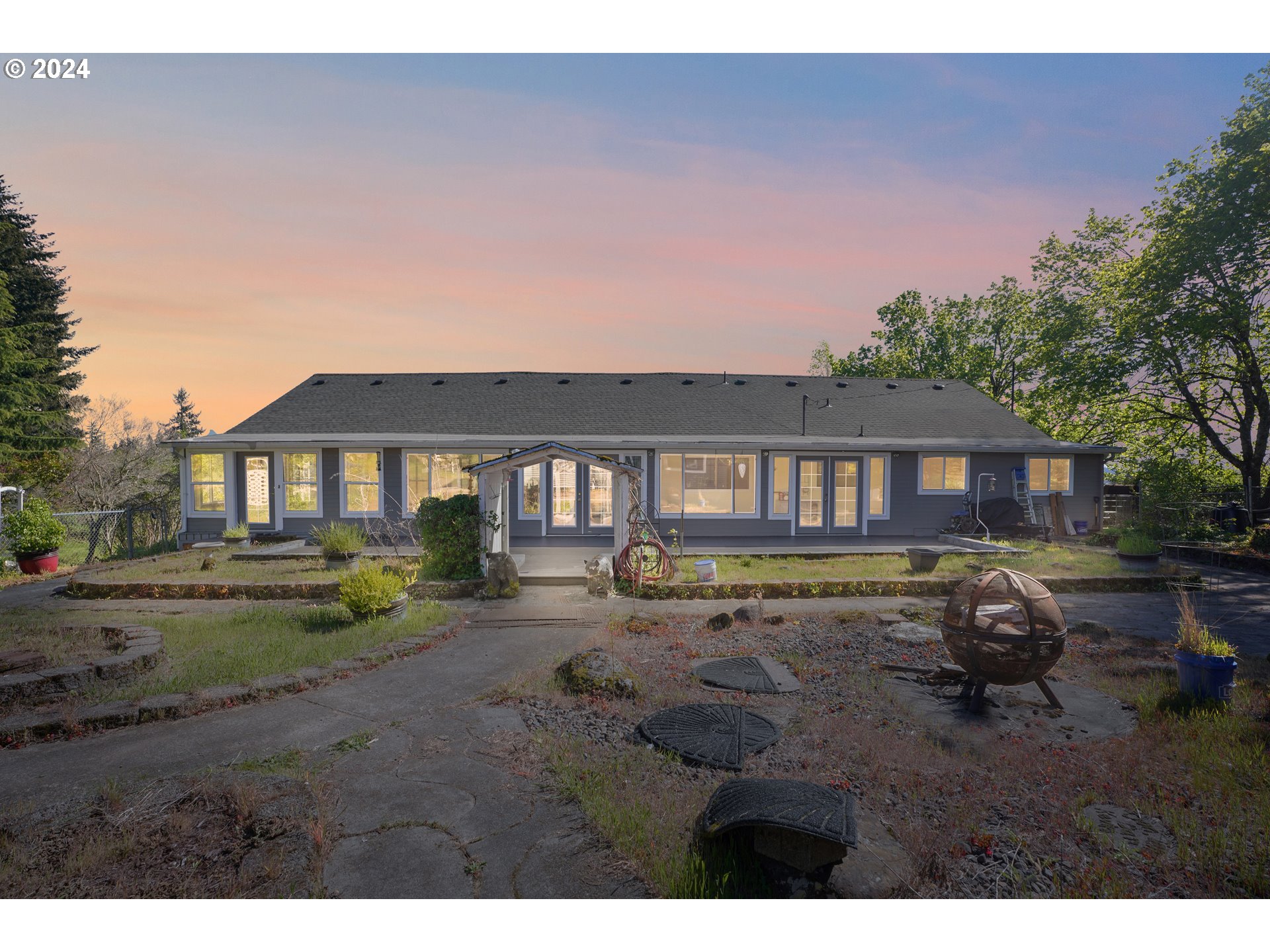 18787 Southeast Sunnyside Road Damascus, OR 97089 - Photo 3 of 36 a view of a house with a yard