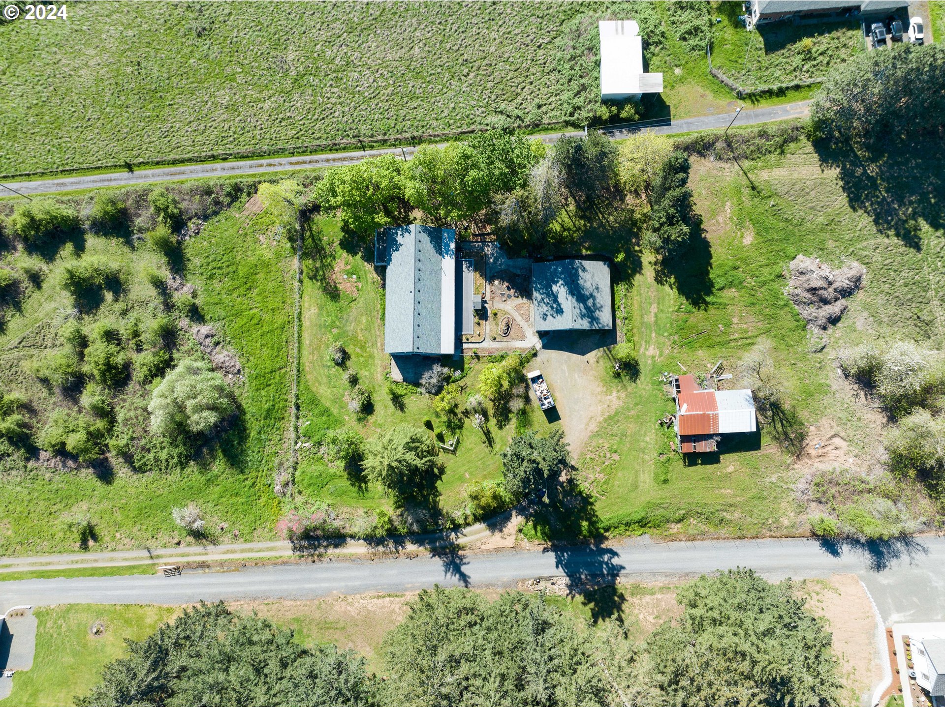 18787 Southeast Sunnyside Road Damascus, OR 97089 - Photo 33 of 36 an aerial view of a house with a yard and potted plants