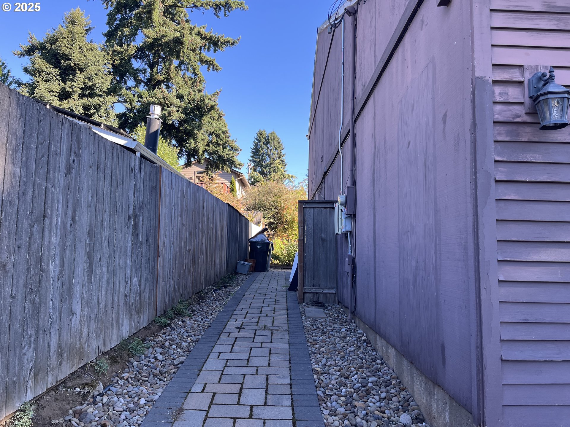 2525 Sunset Avenue West Linn, OR 97068 - Photo 2 of 22 a view of a pathway with a wooden fence