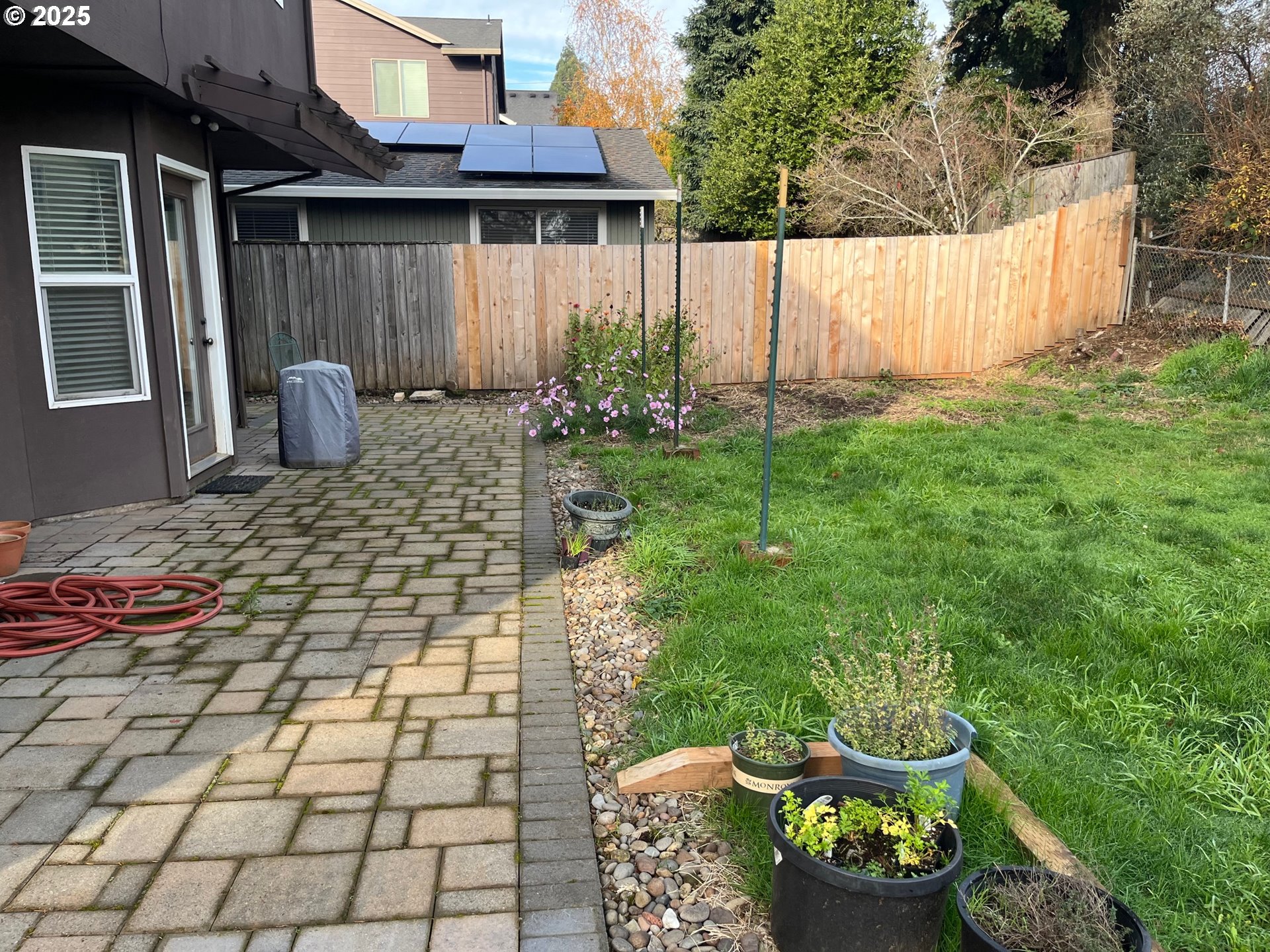 2525 Sunset Avenue West Linn, OR 97068 - Photo 21 of 22 a view of a backyard with plants and large trees