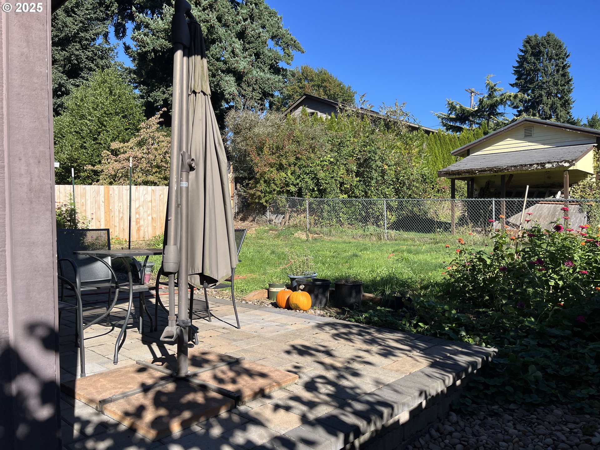 2525 Sunset Avenue West Linn, OR 97068 - Photo 5 of 22 a view of a patio with chair and tables back yard of the house