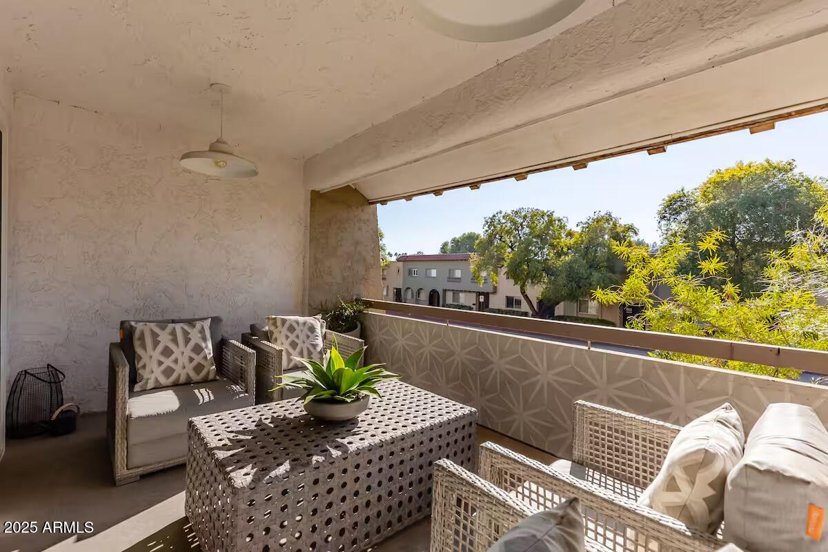 7625 East Camelback Road, Unit A252 Scottsdale, AZ 85251 - Photo 21 of 29 a living room with furniture