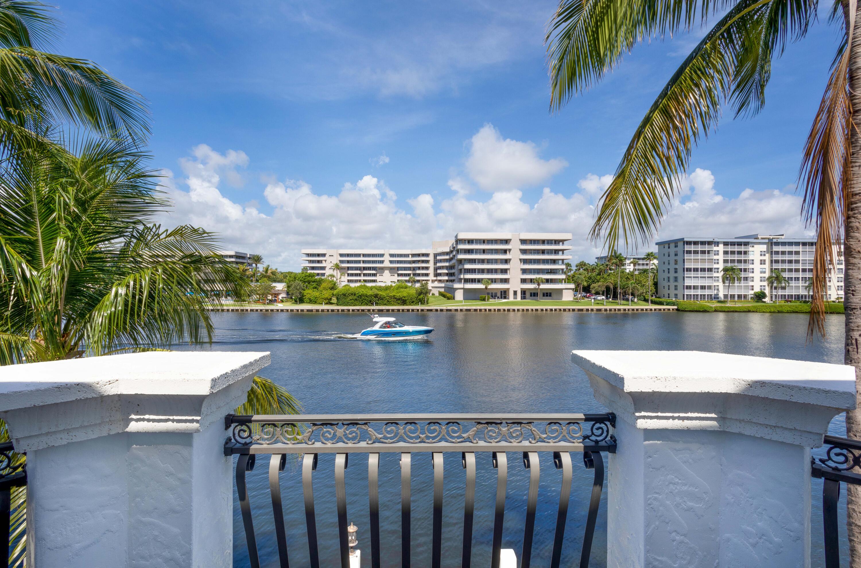 1003 Rhodes Villa Avenue Delray Beach, FL 33483 - Photo 16 of 37 MASTER_BED_BALCONY_VIEW_STRAIGHT